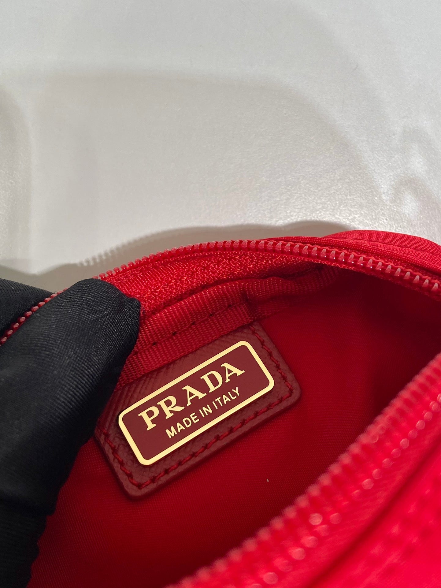 CLUTCH 12 IN PASSION RED RE-NYLON
