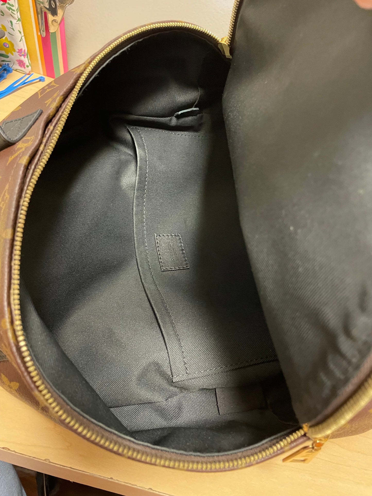 Backpack Luxury Designer By Louis Vuitton, Size: Medium