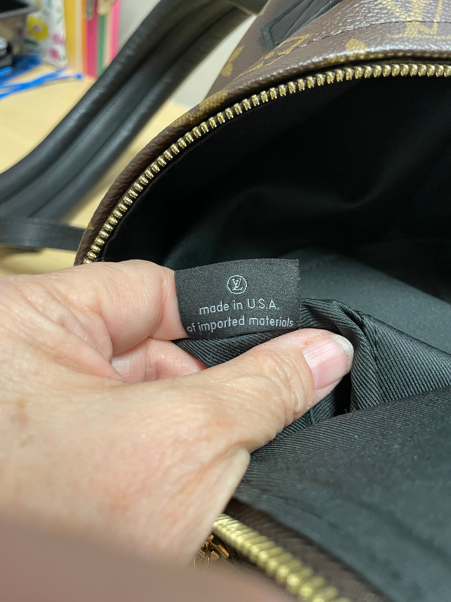 Backpack Luxury Designer By Louis Vuitton, Size: Medium