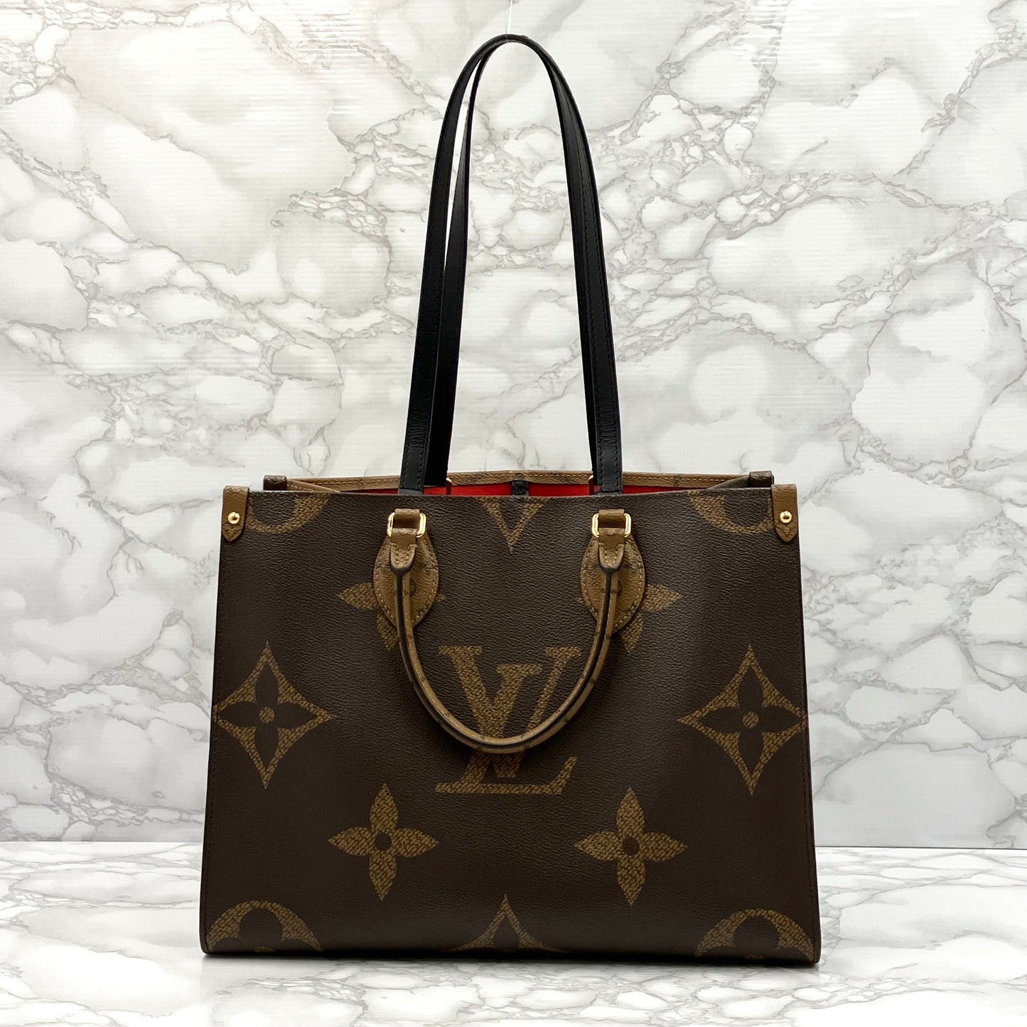 LOUIS VUITTON On The Go MM Monogram Giant Reverse