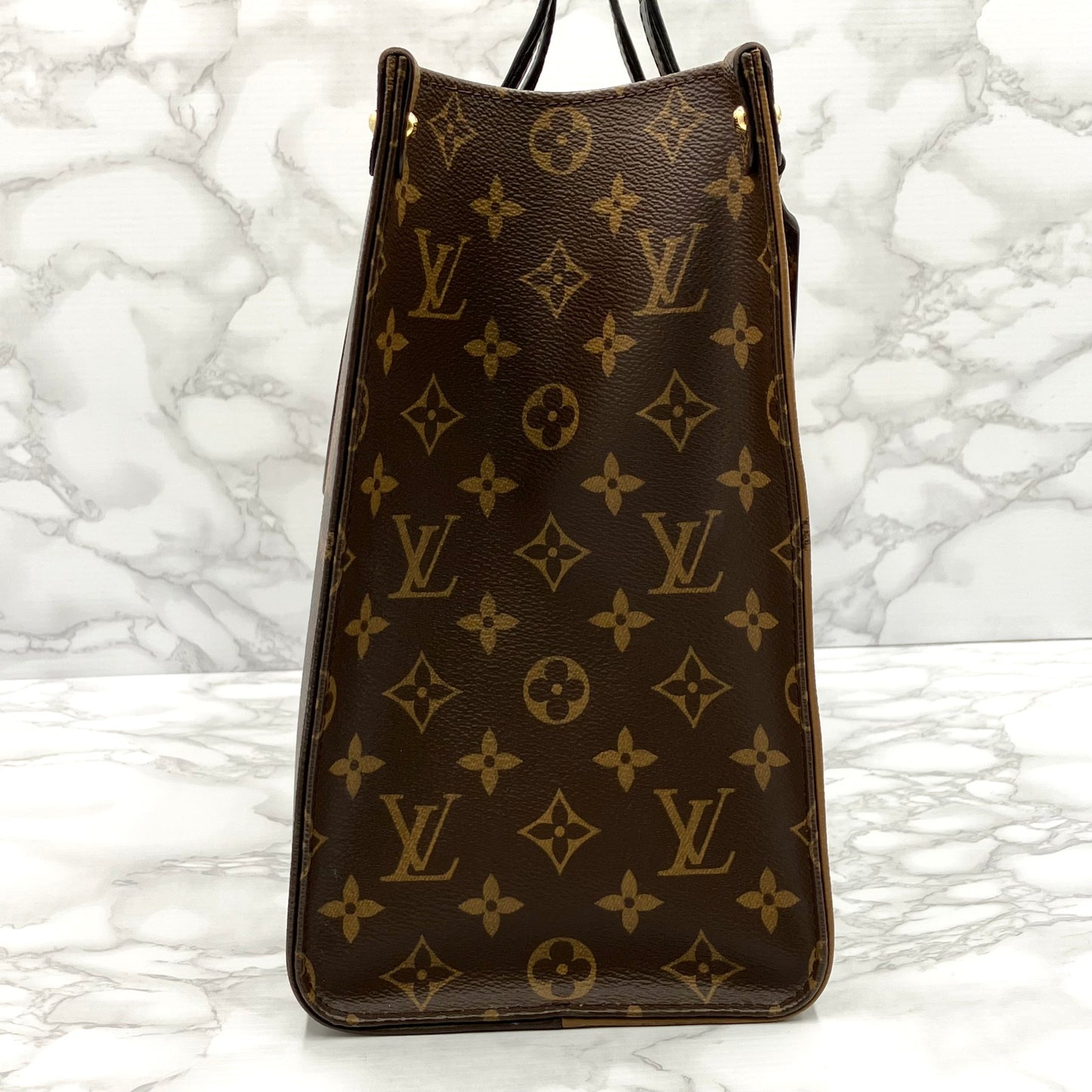 LOUIS VUITTON On The Go MM Monogram Giant Reverse