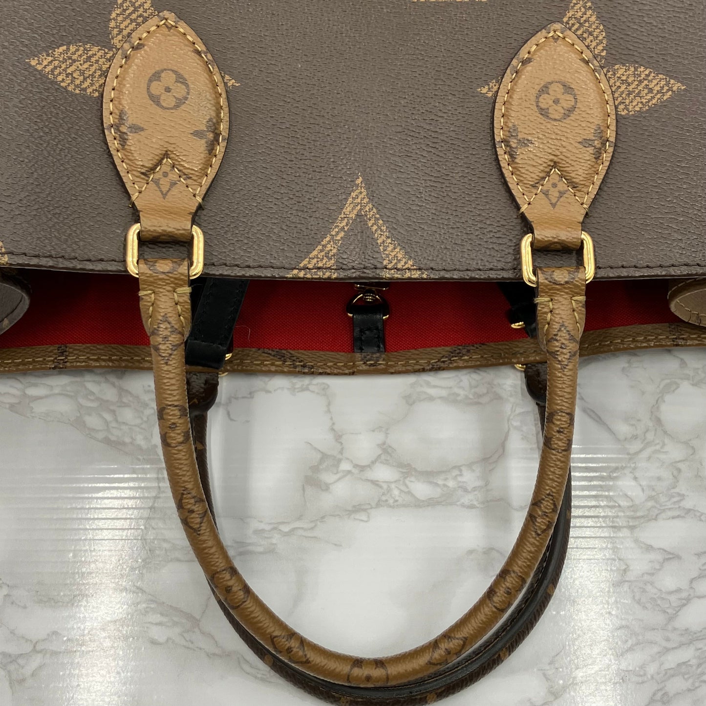 LOUIS VUITTON On The Go MM Monogram Giant Reverse
