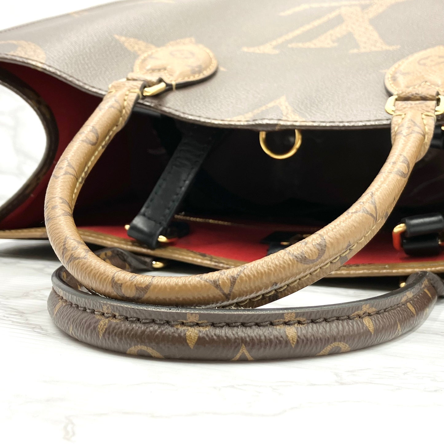 LOUIS VUITTON On The Go MM Monogram Giant Reverse