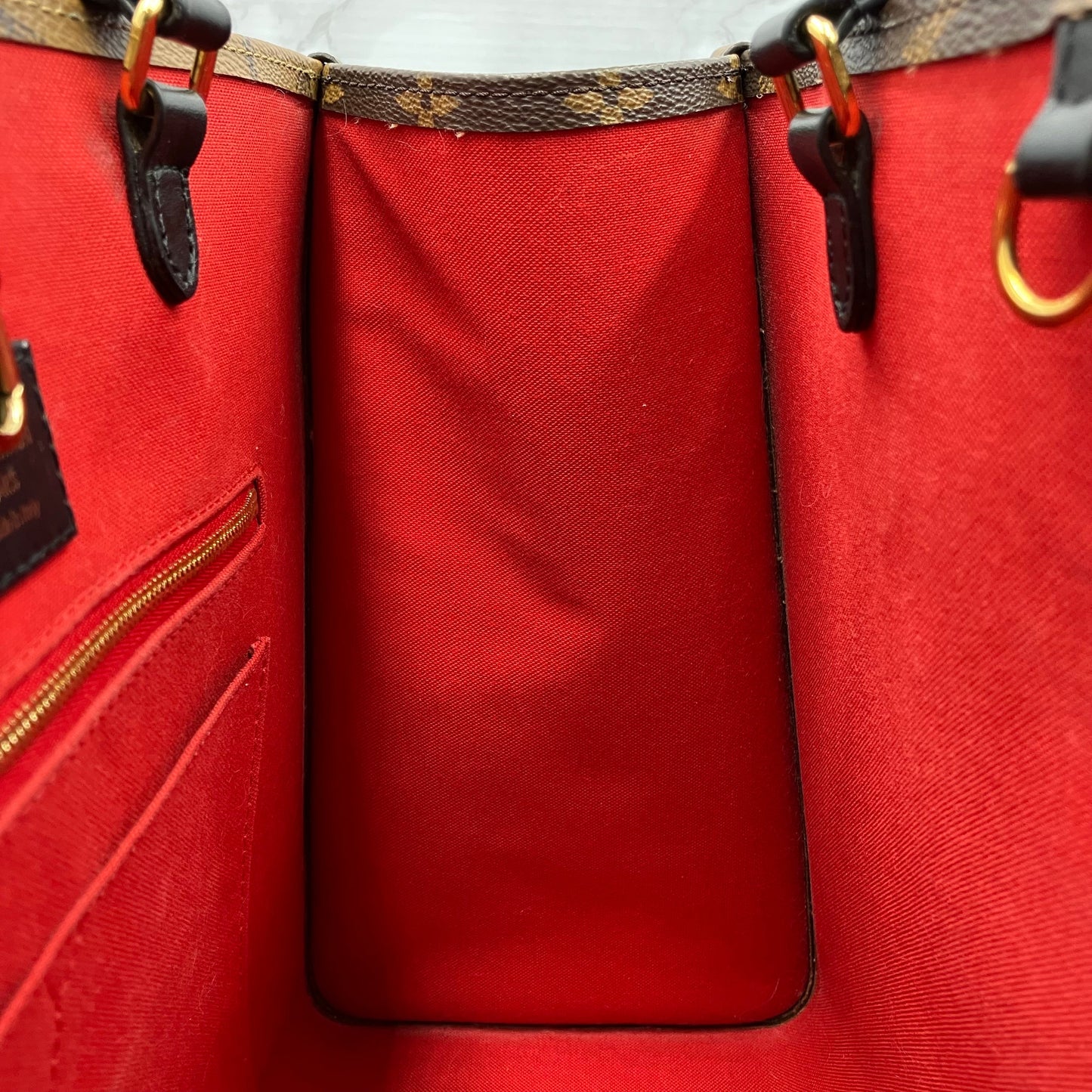 LOUIS VUITTON On The Go MM Monogram Giant Reverse