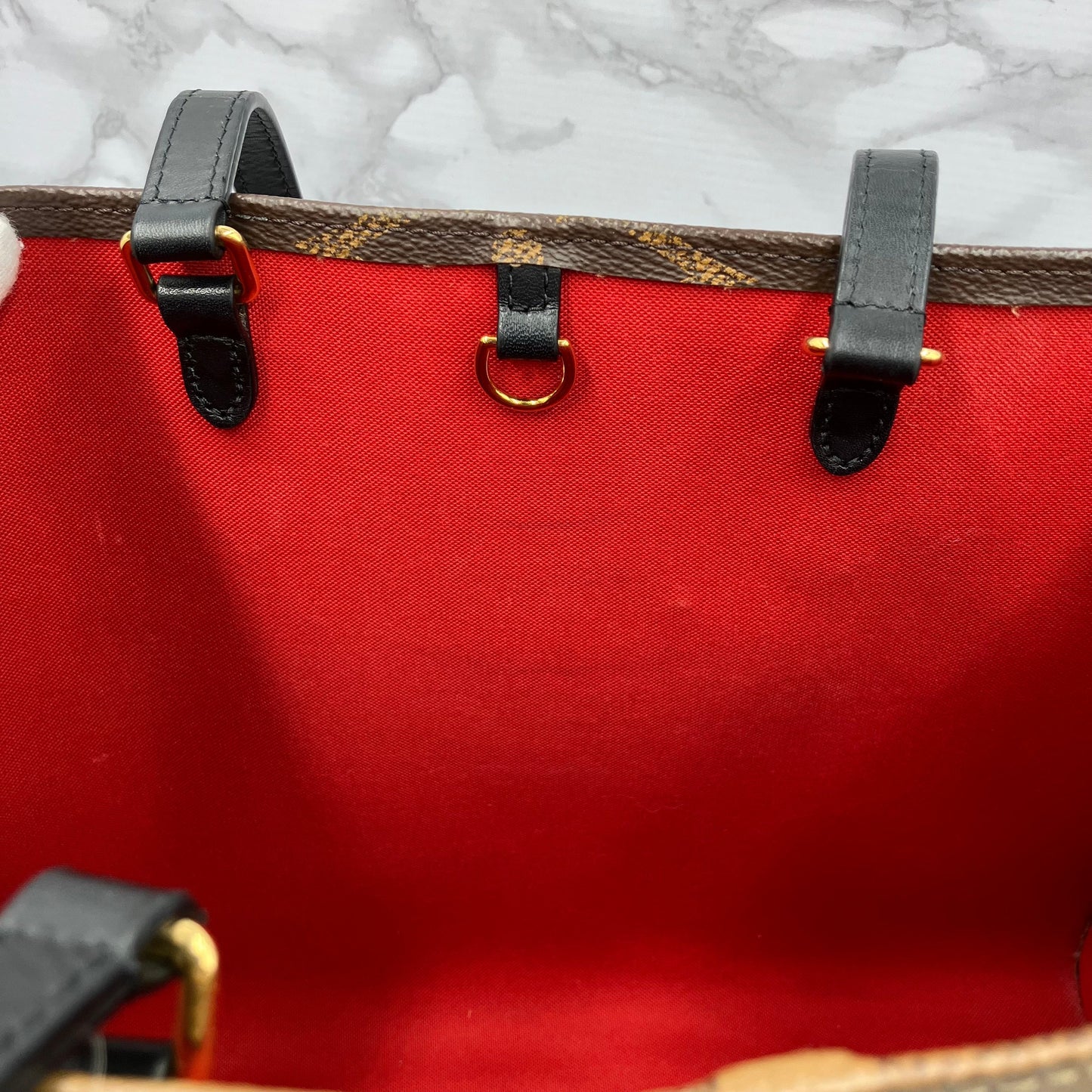 LOUIS VUITTON On The Go MM Monogram Giant Reverse