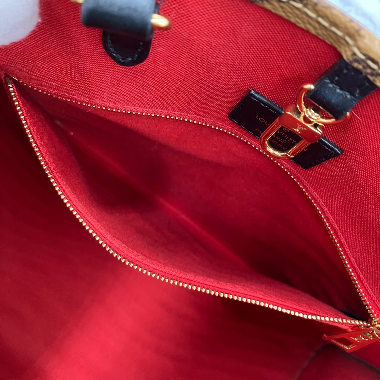 LOUIS VUITTON On The Go MM Monogram Giant Reverse