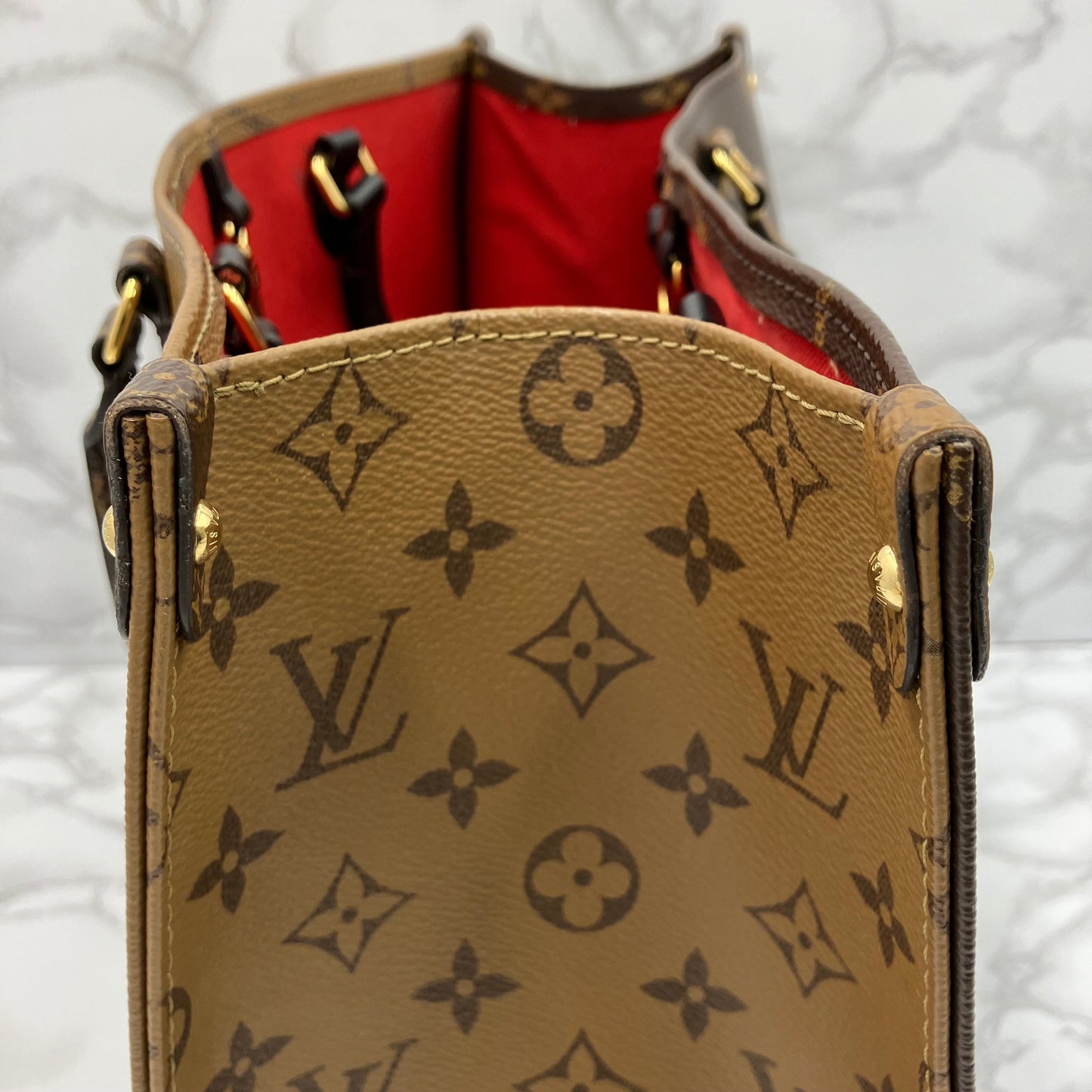 LOUIS VUITTON On The Go MM Monogram Giant Reverse