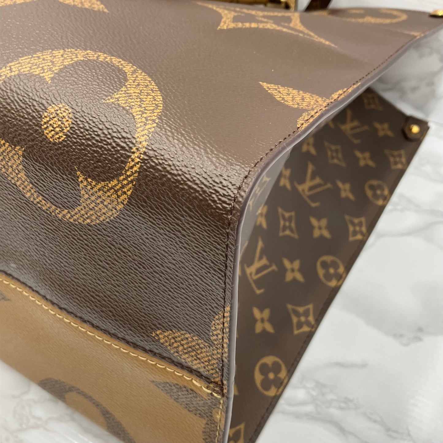 LOUIS VUITTON On The Go GM Monogram Giant Reverse