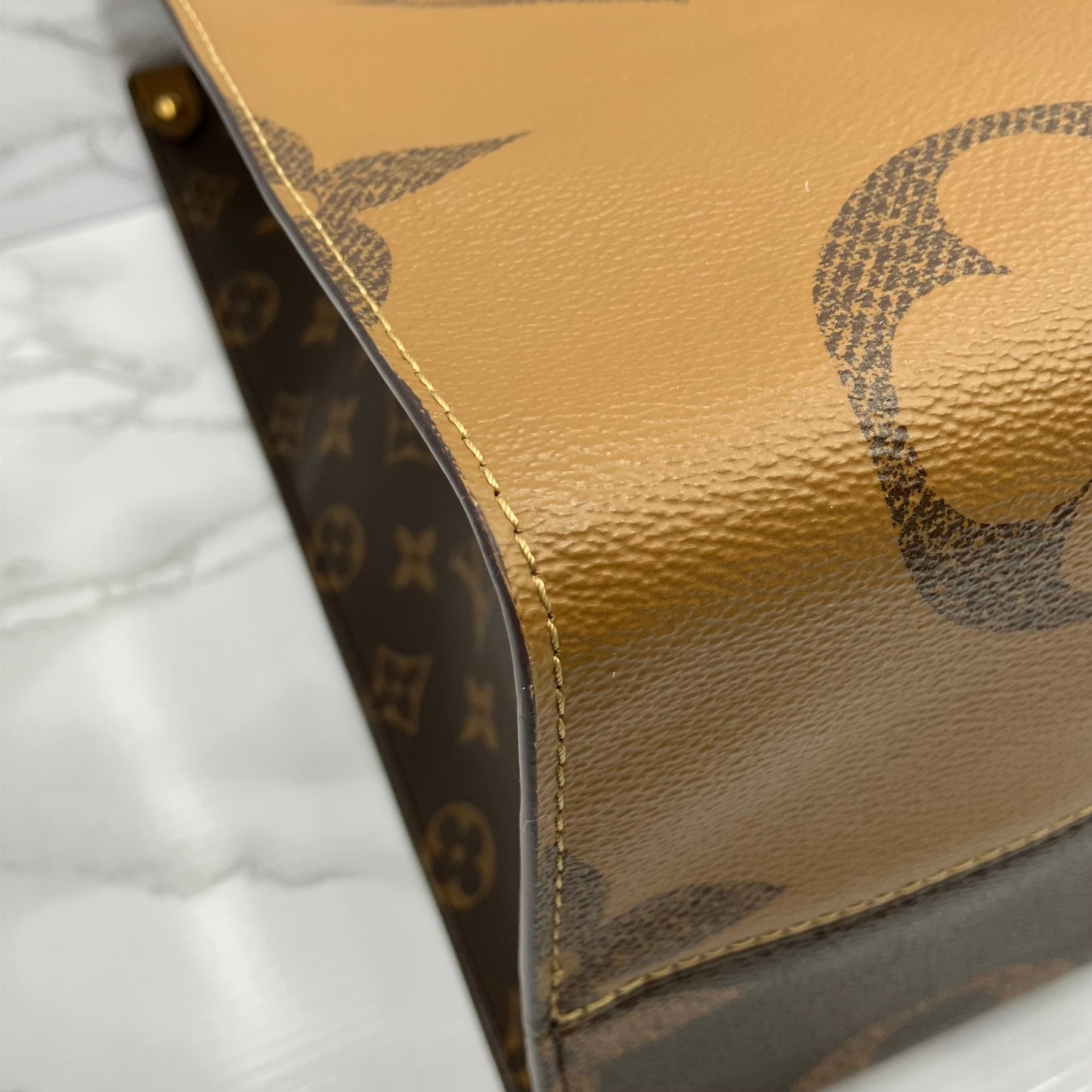 LOUIS VUITTON On The Go GM Monogram Giant Reverse
