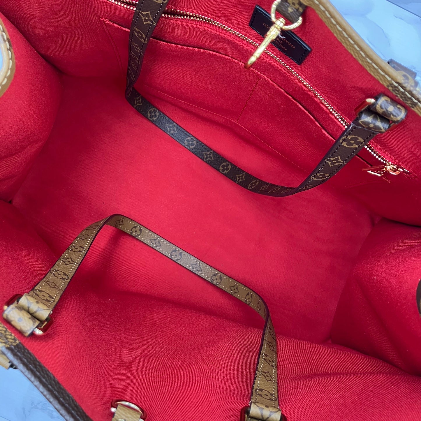 LOUIS VUITTON On The Go GM Monogram Giant Reverse