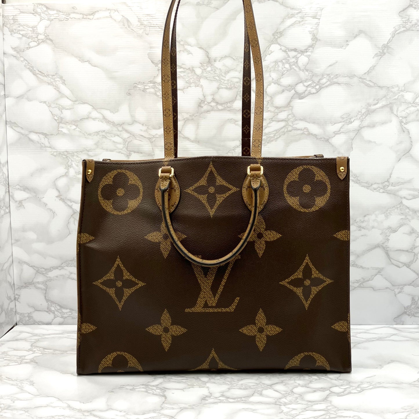 LOUIS VUITTON On The Go GM Monogram Giant Reverse
