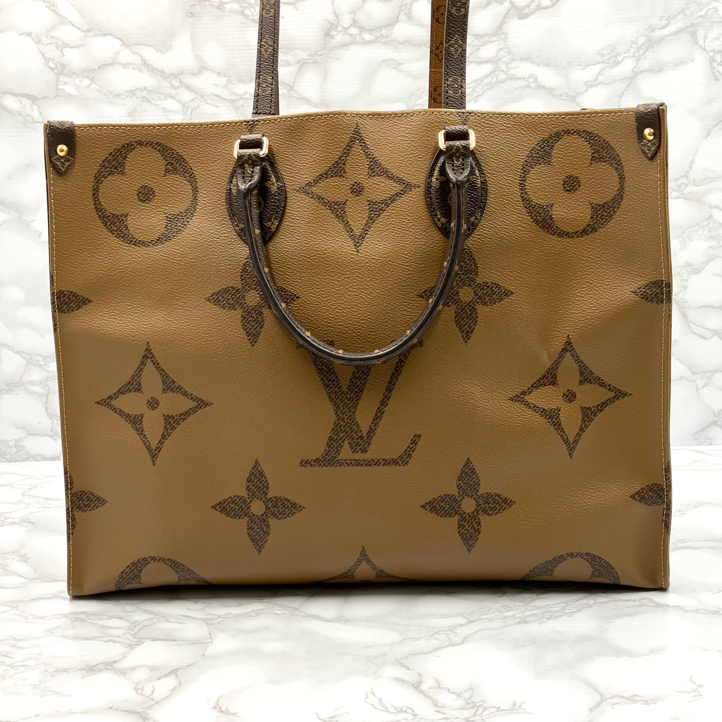 LOUIS VUITTON On The Go GM Monogram Giant Reverse