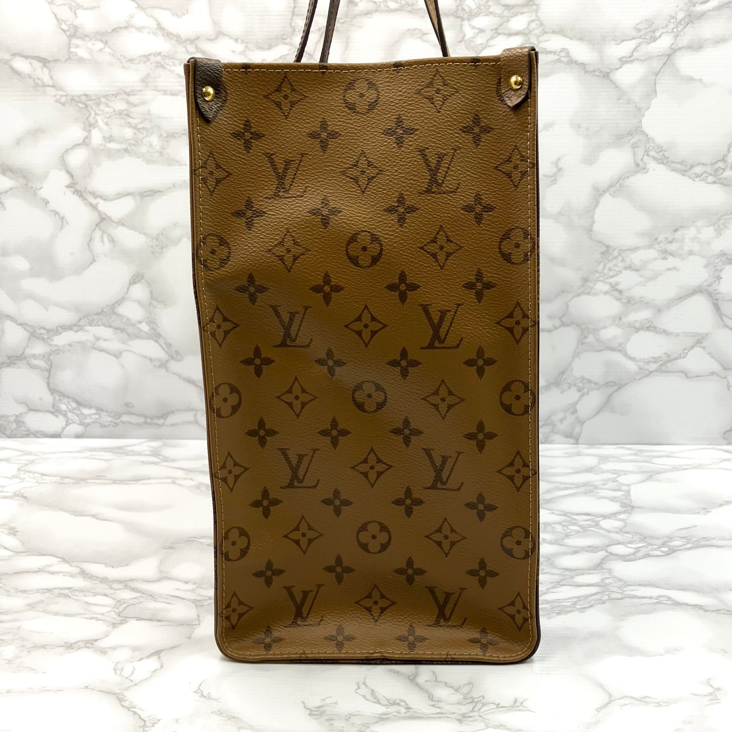 LOUIS VUITTON On The Go GM Monogram Giant Reverse