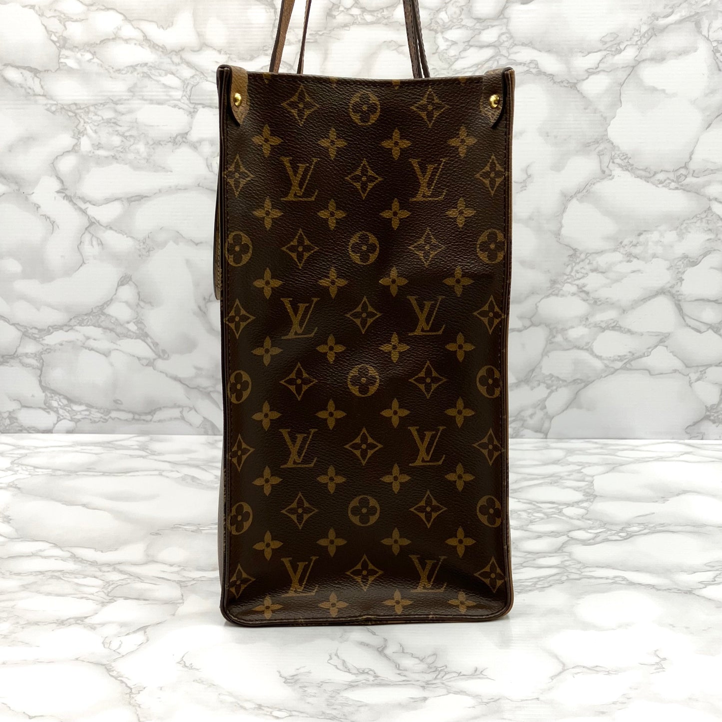 LOUIS VUITTON On The Go GM Monogram Giant Reverse