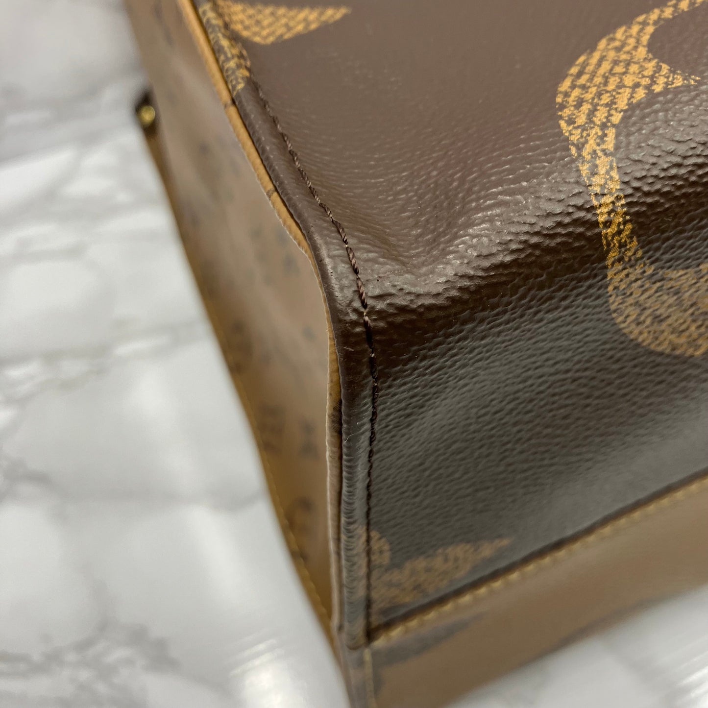 LOUIS VUITTON On The Go GM Monogram Giant Reverse