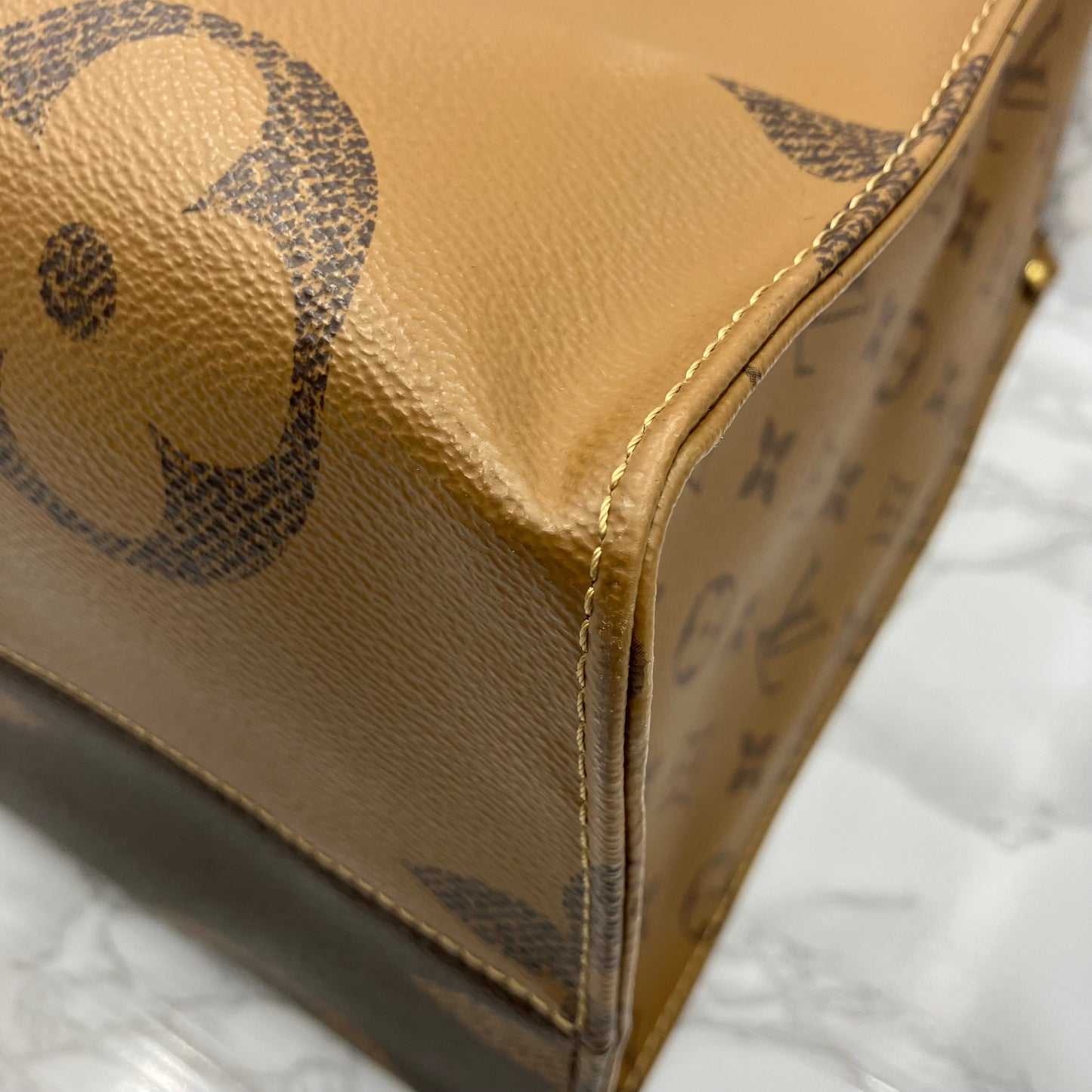 LOUIS VUITTON On The Go GM Monogram Giant Reverse