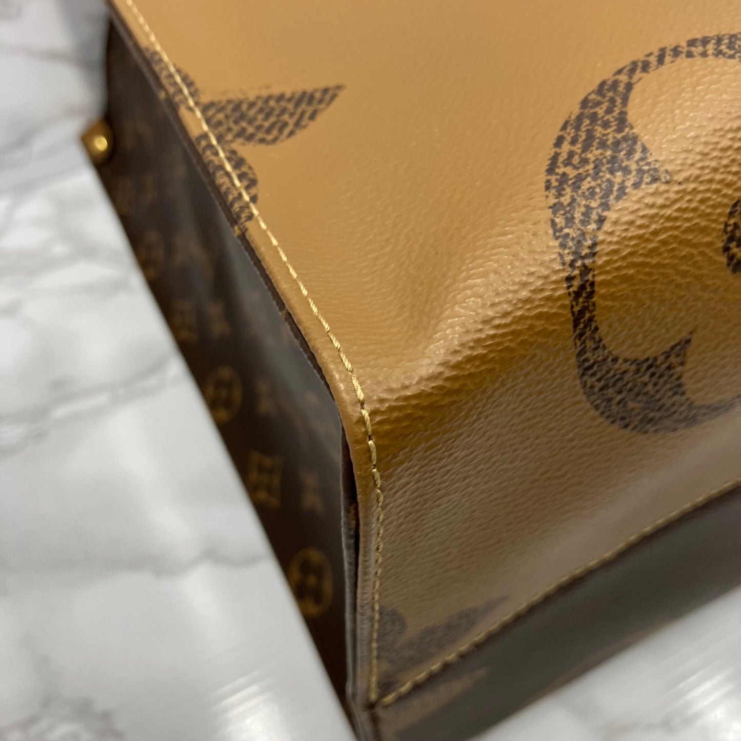 LOUIS VUITTON On The Go GM Monogram Giant Reverse