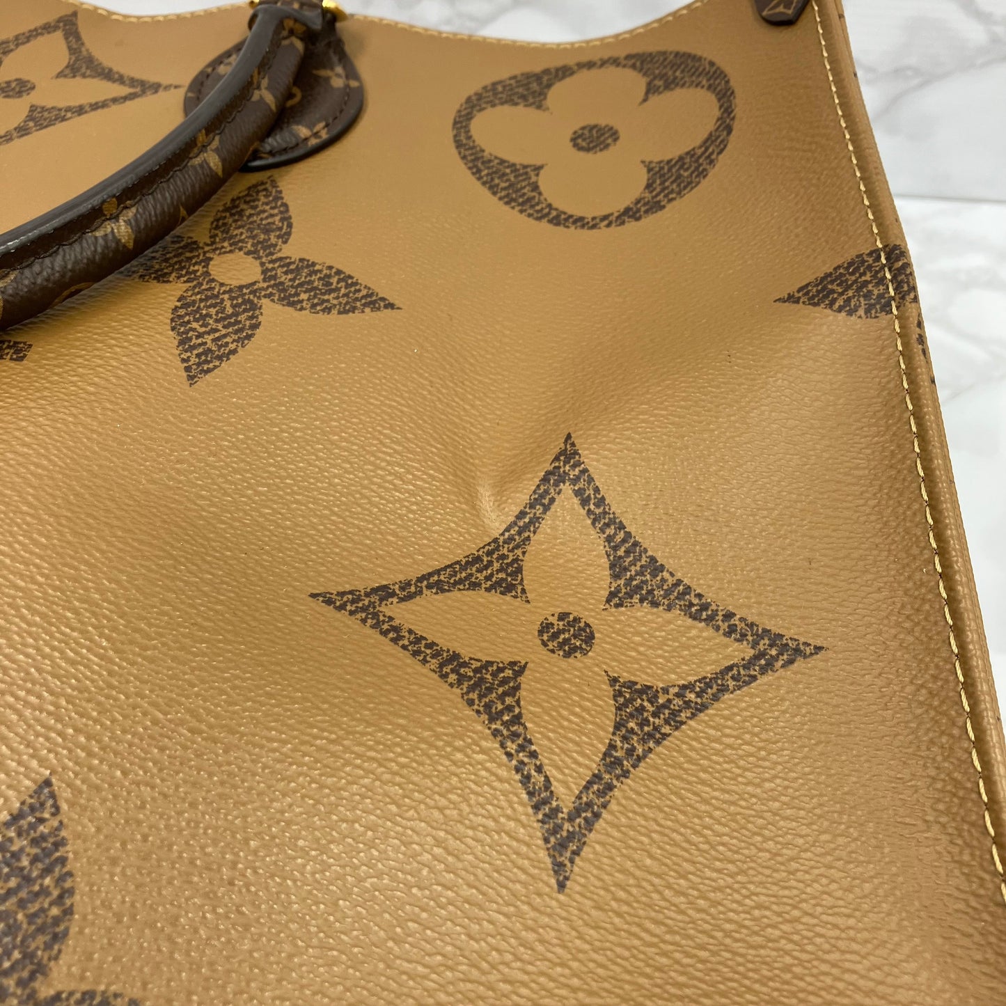 LOUIS VUITTON On The Go GM Monogram Giant Reverse