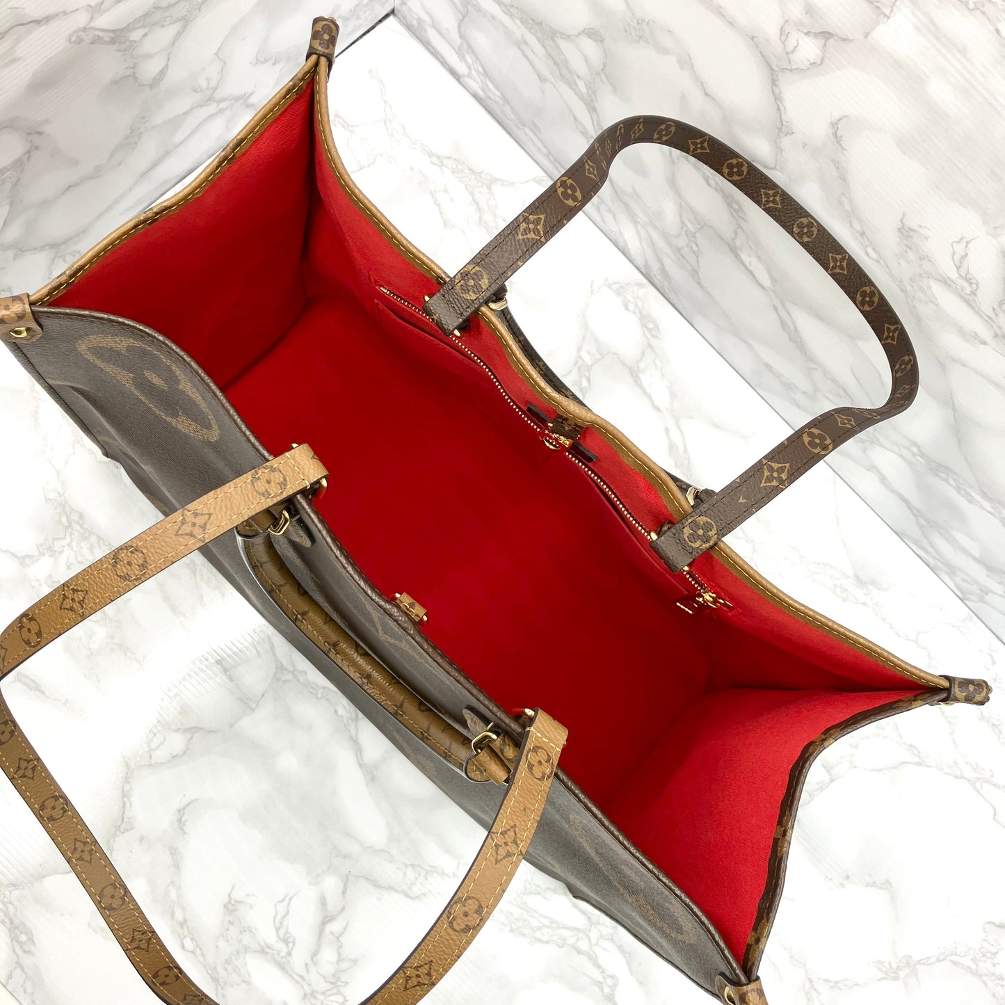 LOUIS VUITTON On The Go GM Monogram Giant Reverse