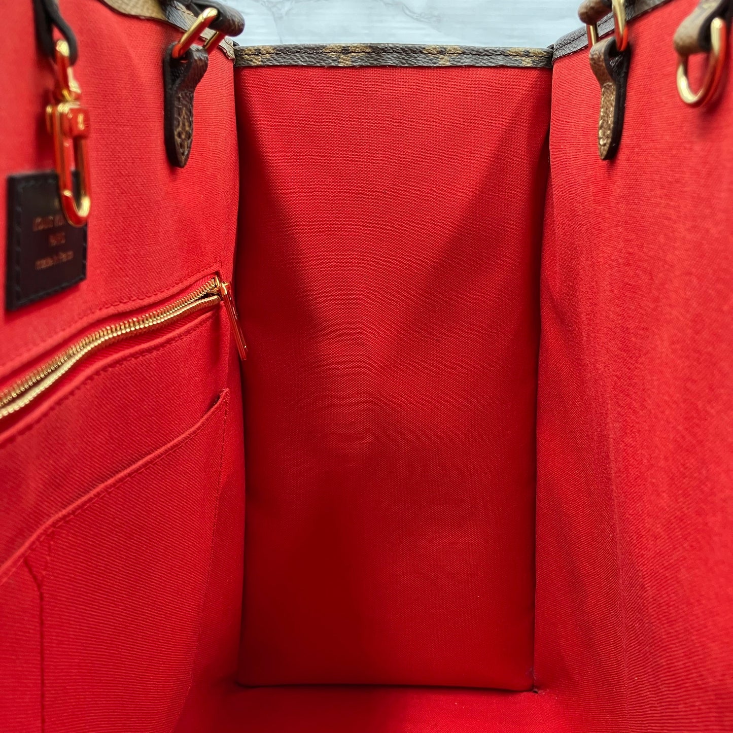 LOUIS VUITTON On The Go GM Monogram Giant Reverse