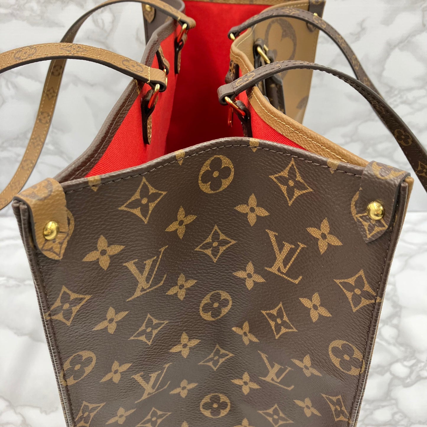 LOUIS VUITTON On The Go GM Monogram Giant Reverse