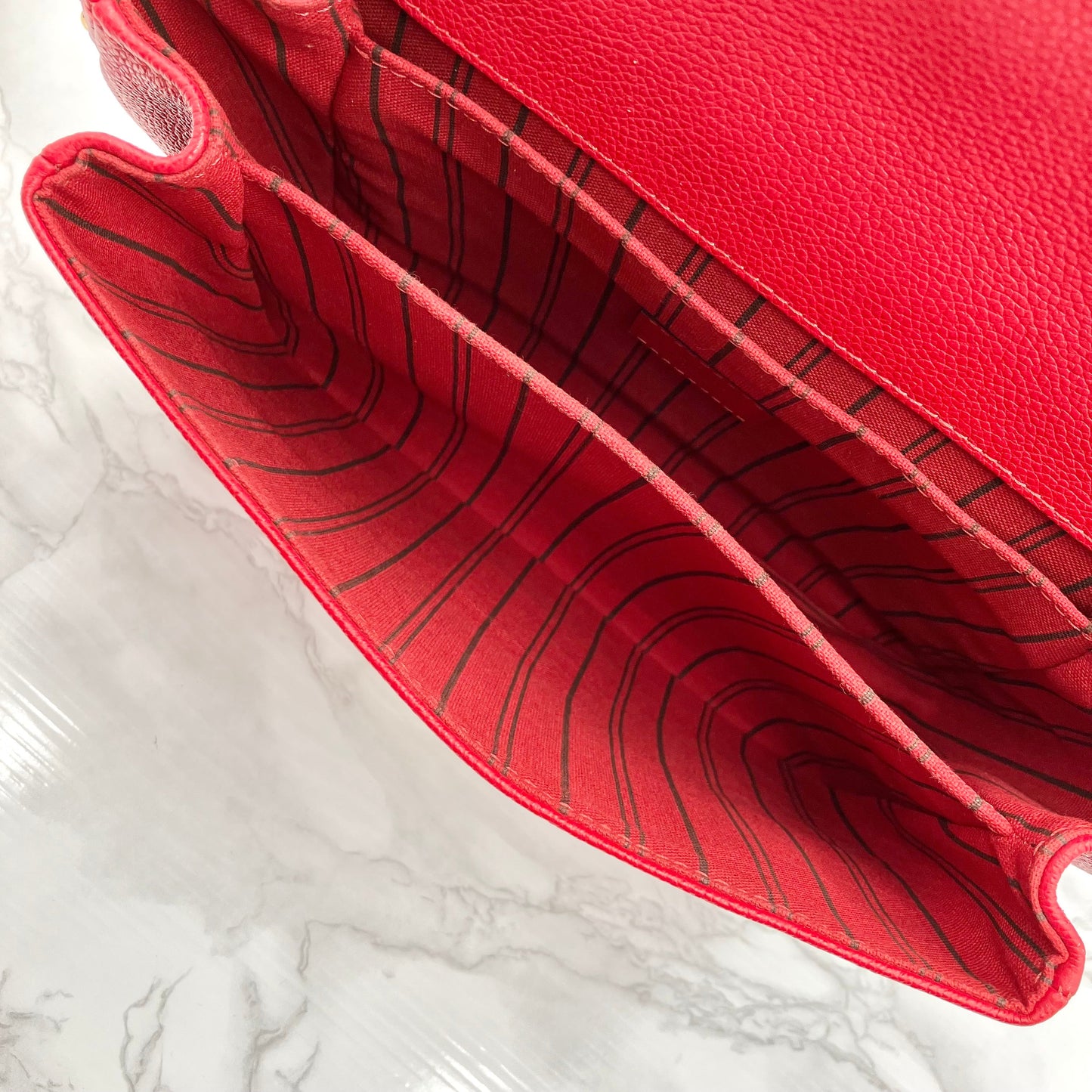 LOUIS VUITTON Amplant Metis