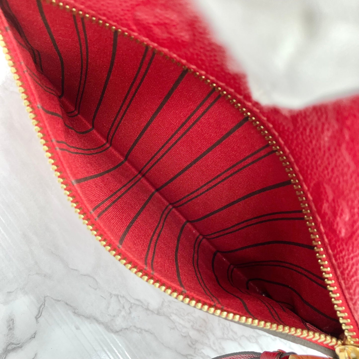 LOUIS VUITTON Amplant Metis