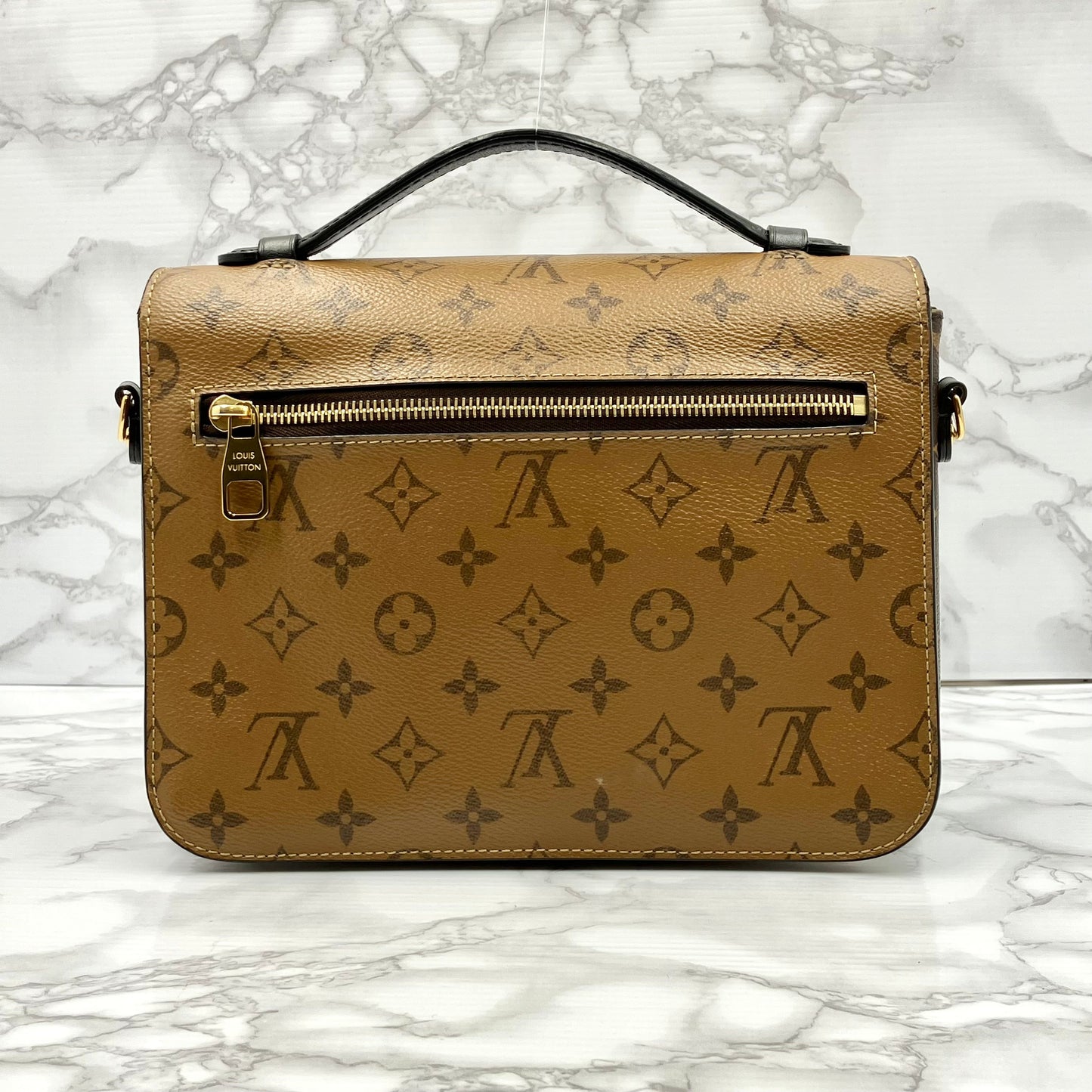 LOUIS VUITTON Monogram Reverse Metis