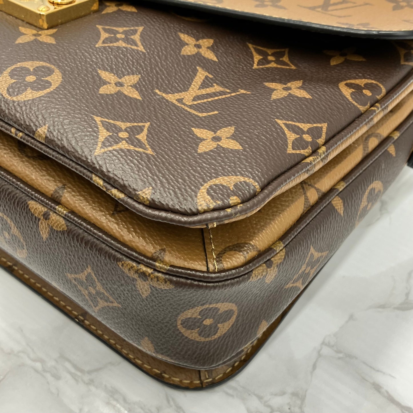 LOUIS VUITTON Monogram Reverse Metis