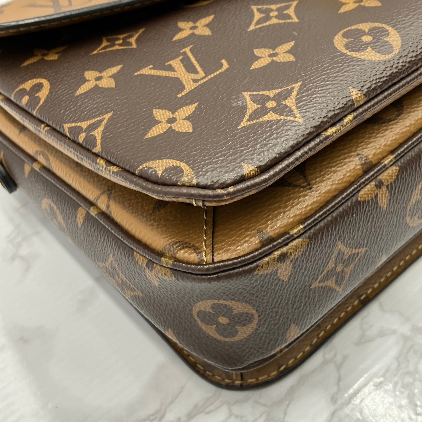 LOUIS VUITTON Monogram Reverse Metis