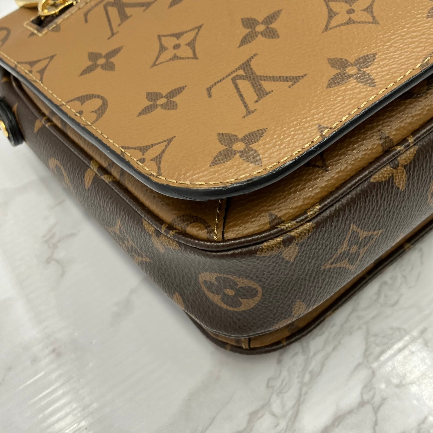 LOUIS VUITTON Monogram Reverse Metis