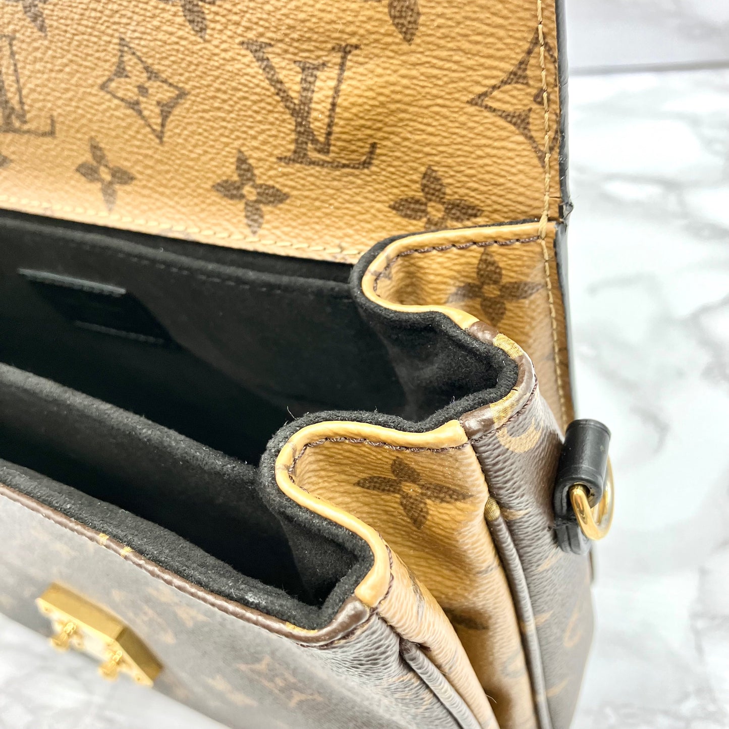 LOUIS VUITTON Monogram Reverse Metis