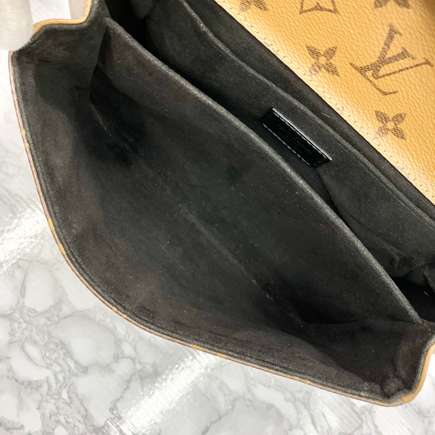 LOUIS VUITTON Monogram Reverse Metis