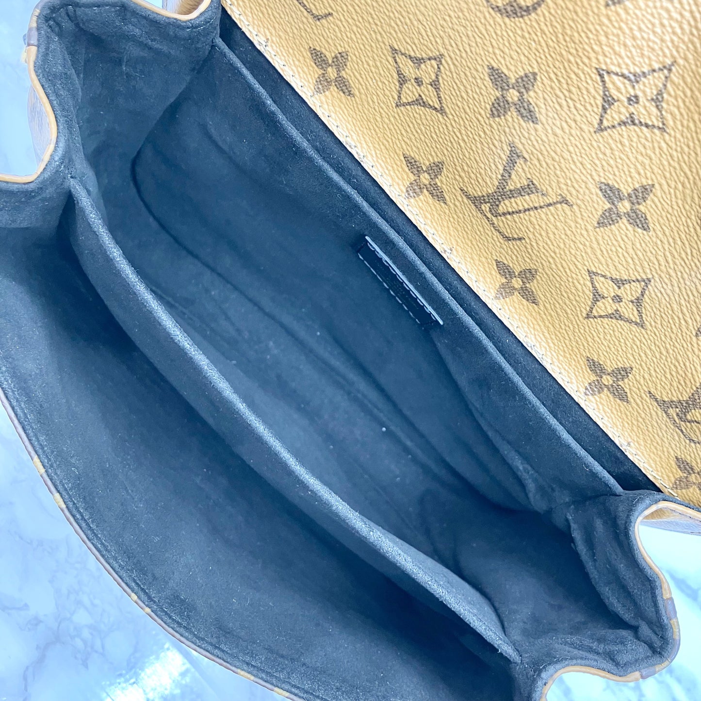 LOUIS VUITTON Monogram Reverse Metis
