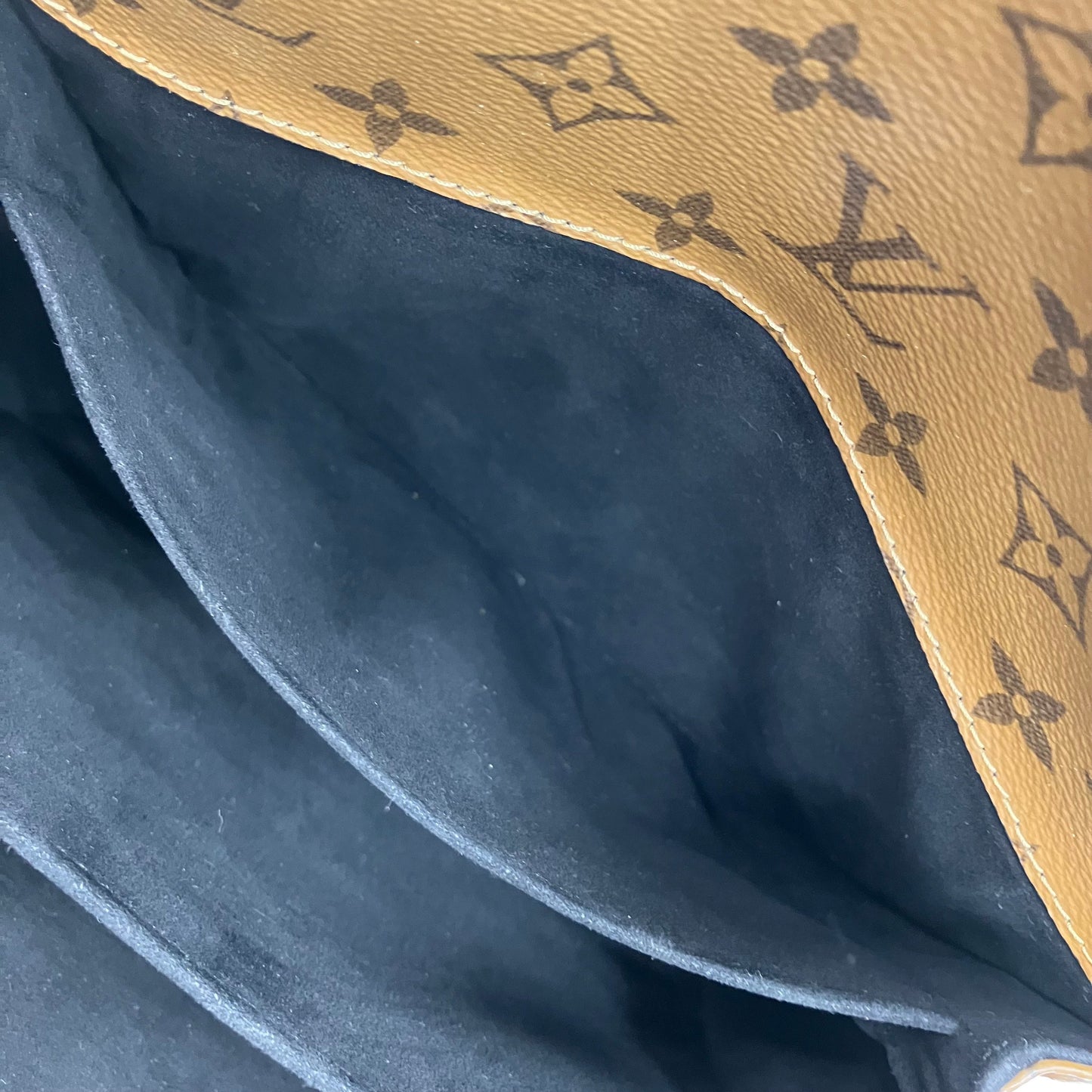 LOUIS VUITTON Monogram Reverse Metis