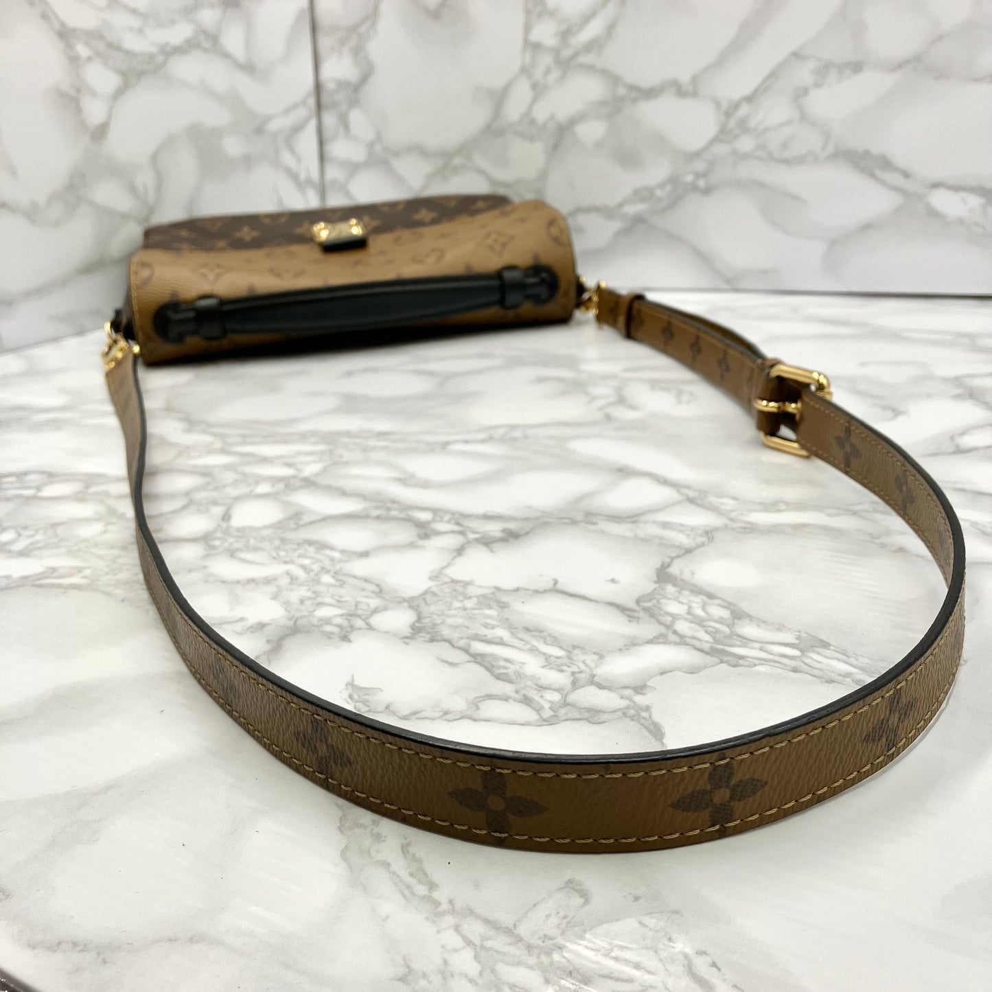 LOUIS VUITTON Monogram Reverse Metis