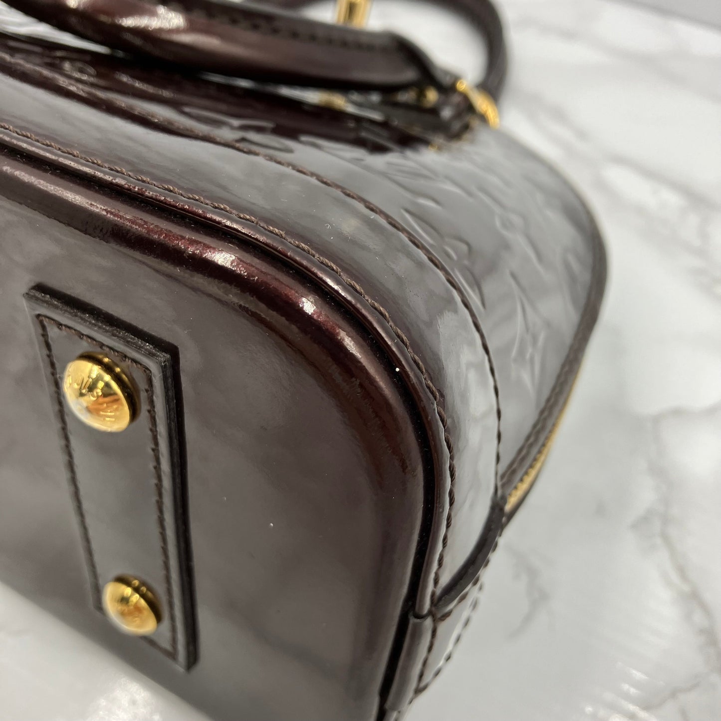 LOUIS VUITTON Alma BB vernis