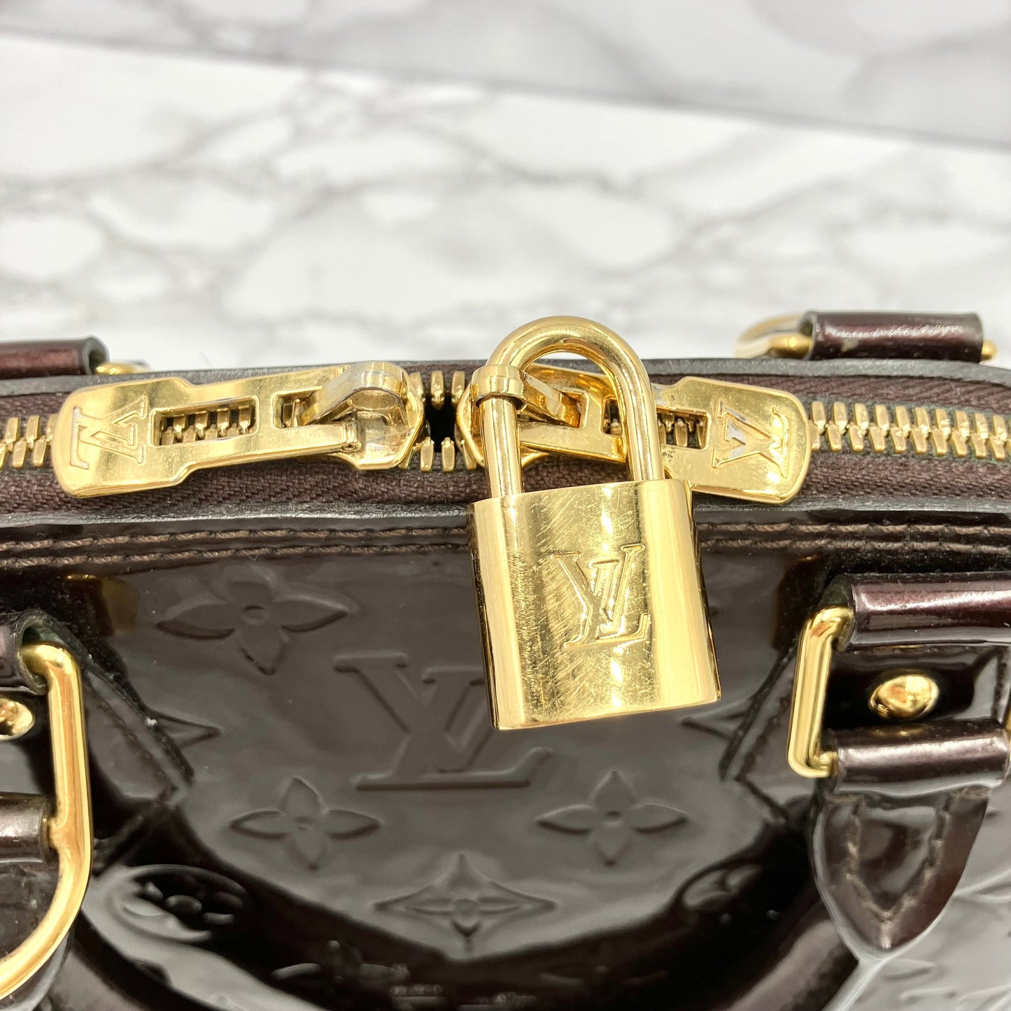 LOUIS VUITTON Alma BB vernis
