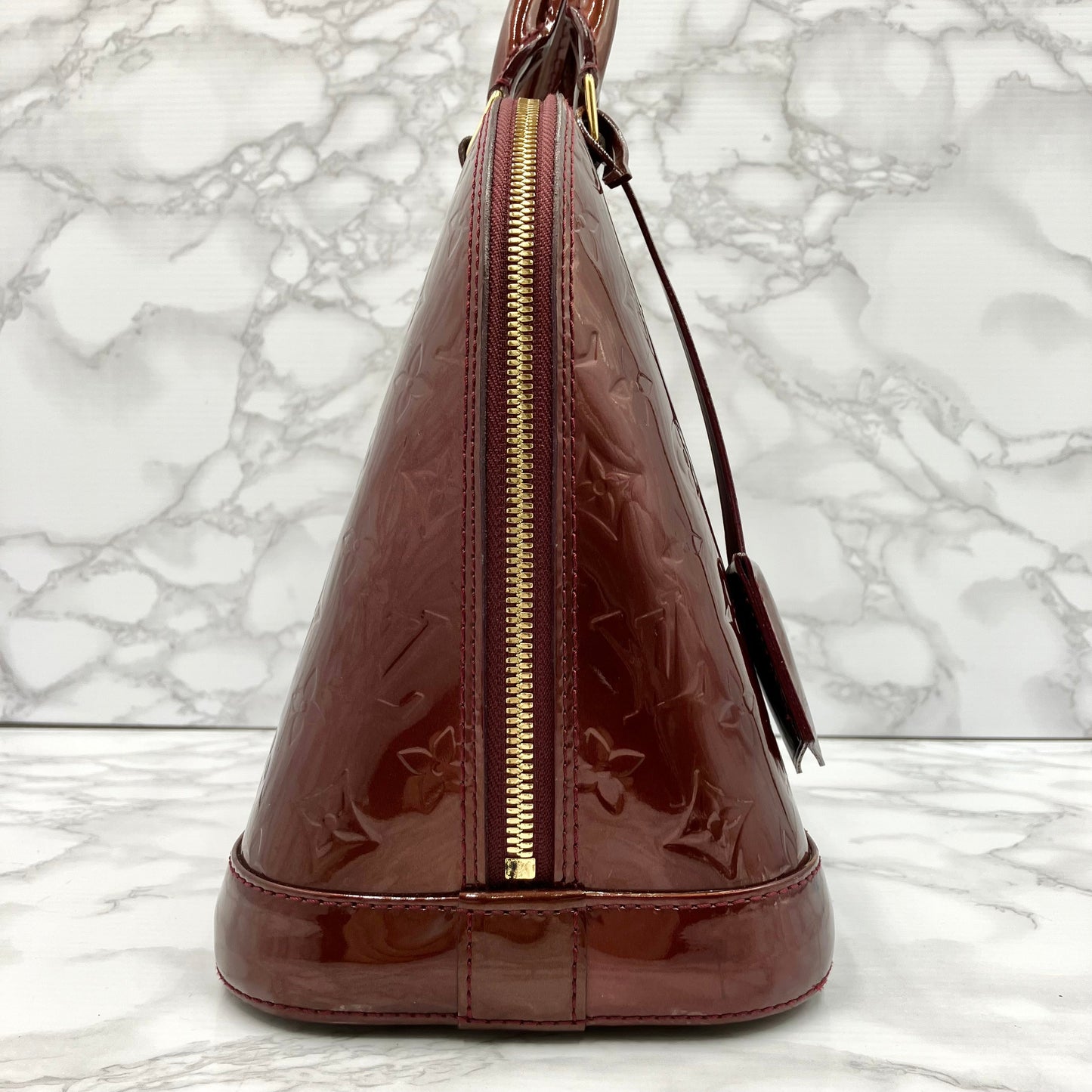 LOUIS VUITTON Vernis Alma PM