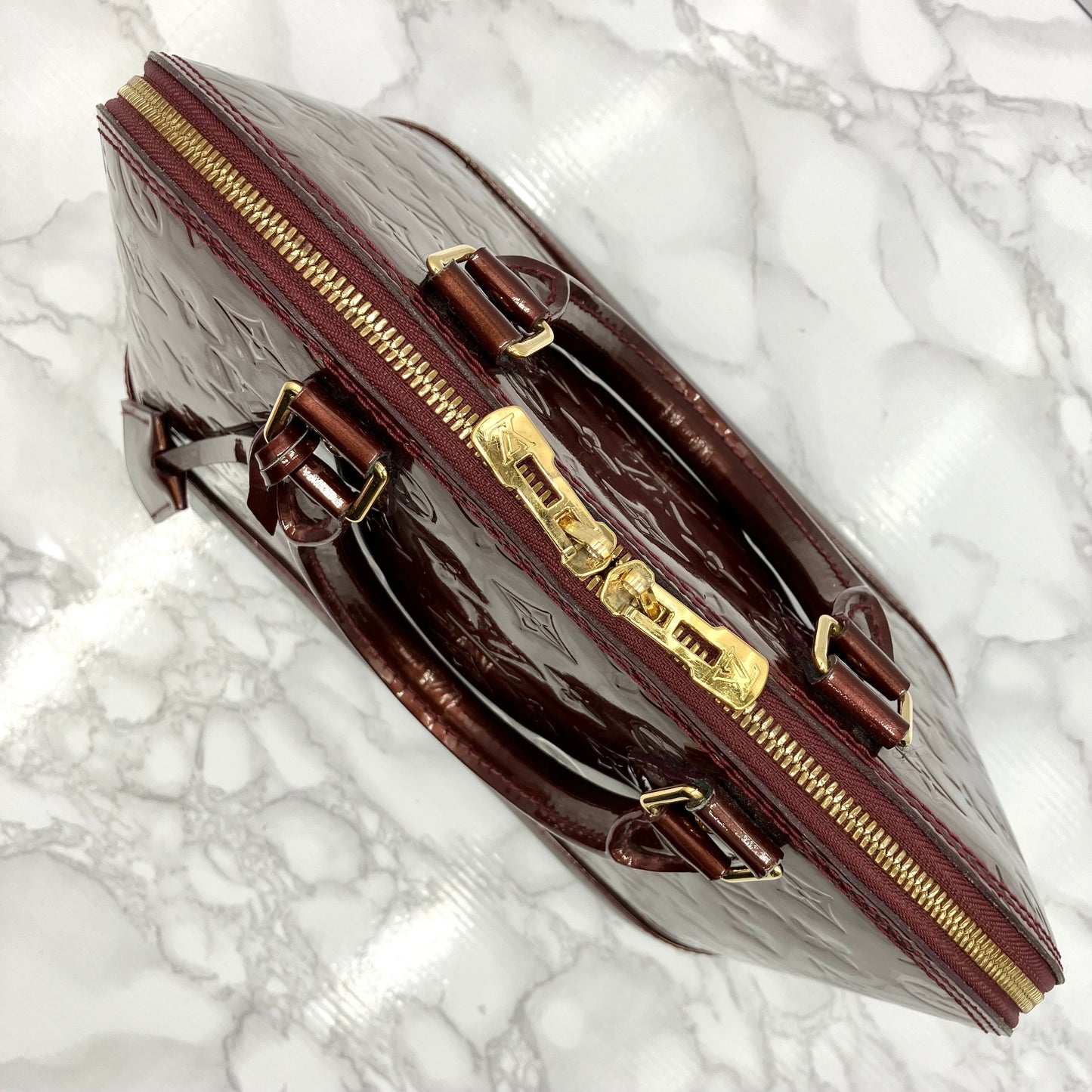 LOUIS VUITTON Vernis Alma PM
