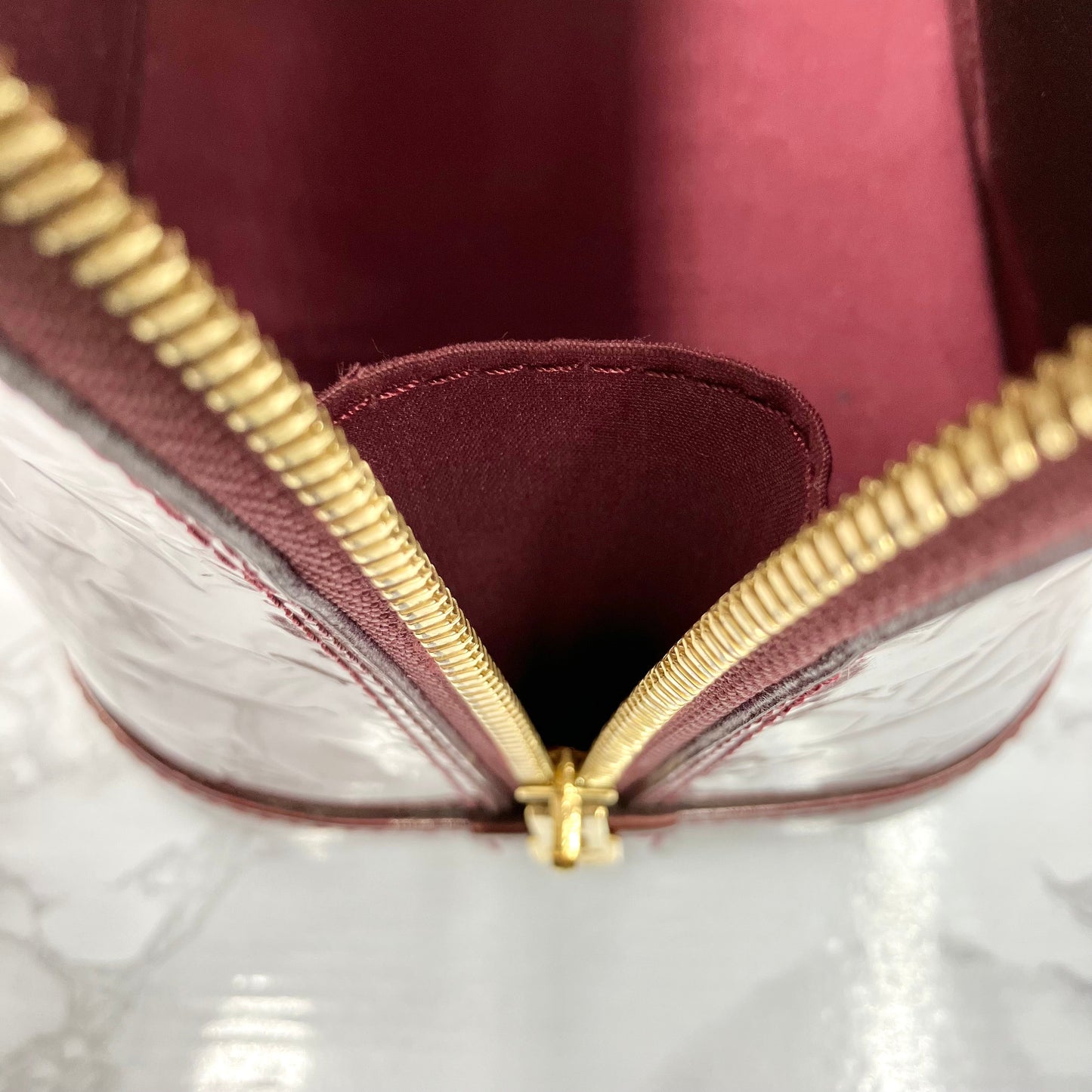 LOUIS VUITTON Vernis Alma PM