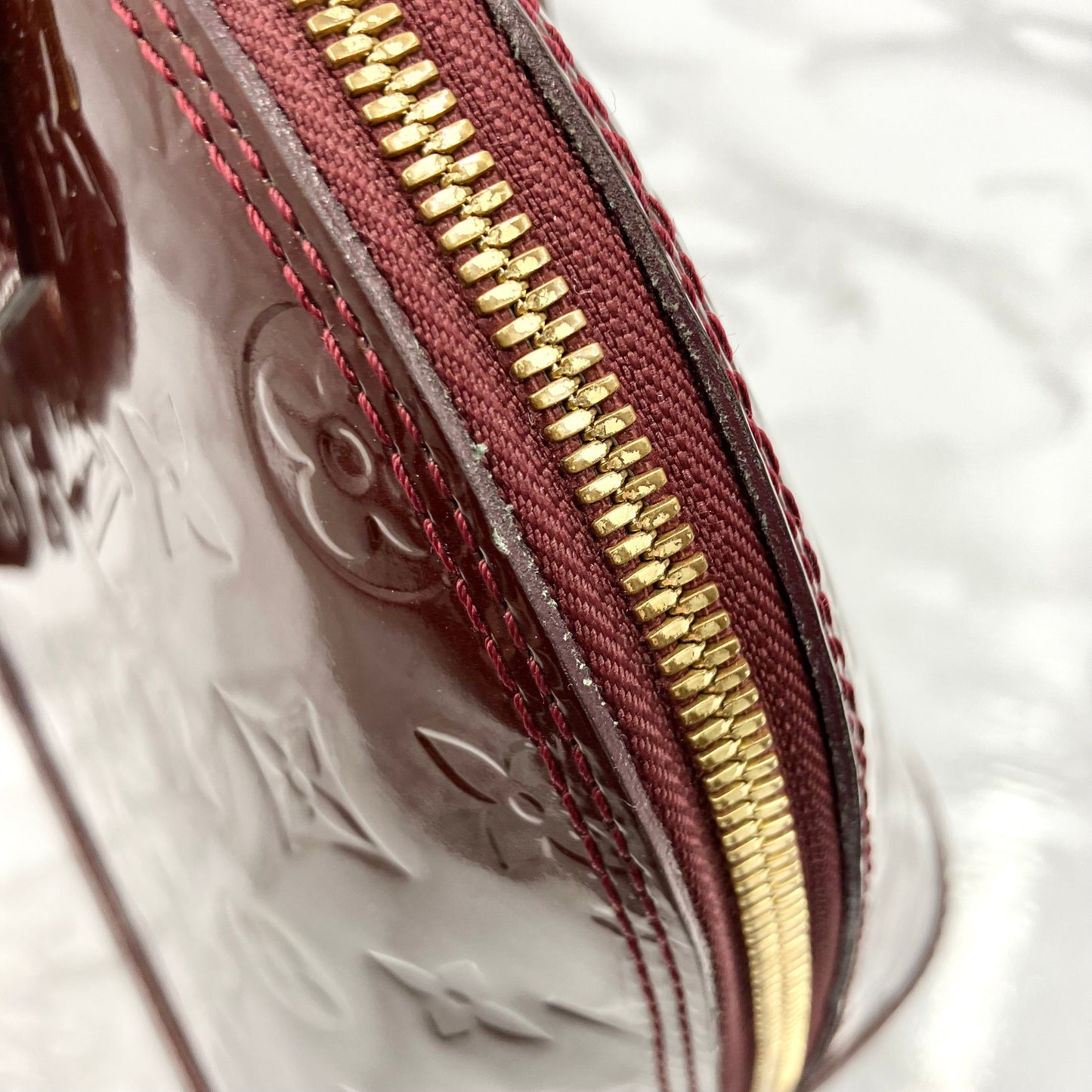 LOUIS VUITTON Vernis Alma PM