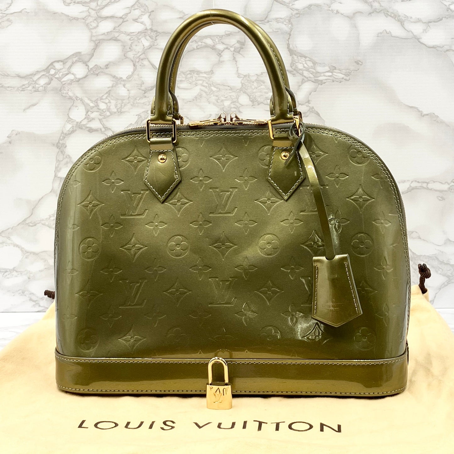 LOUIS VUITTON Vernis Alma handbag