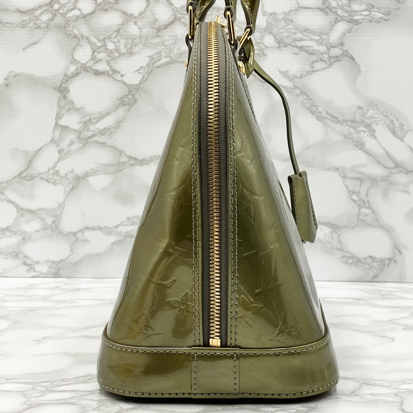 LOUIS VUITTON Vernis Alma handbag