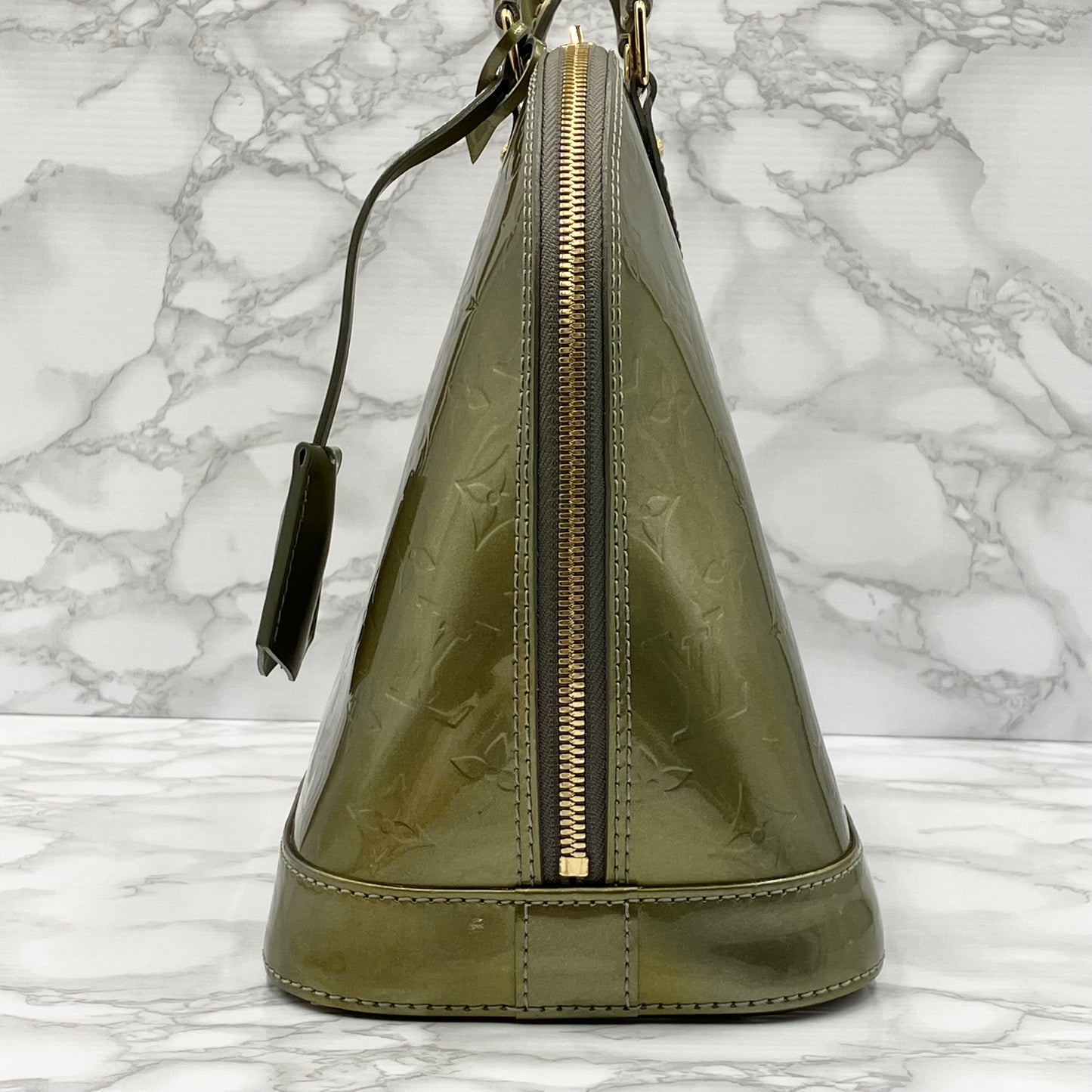 LOUIS VUITTON Vernis Alma handbag