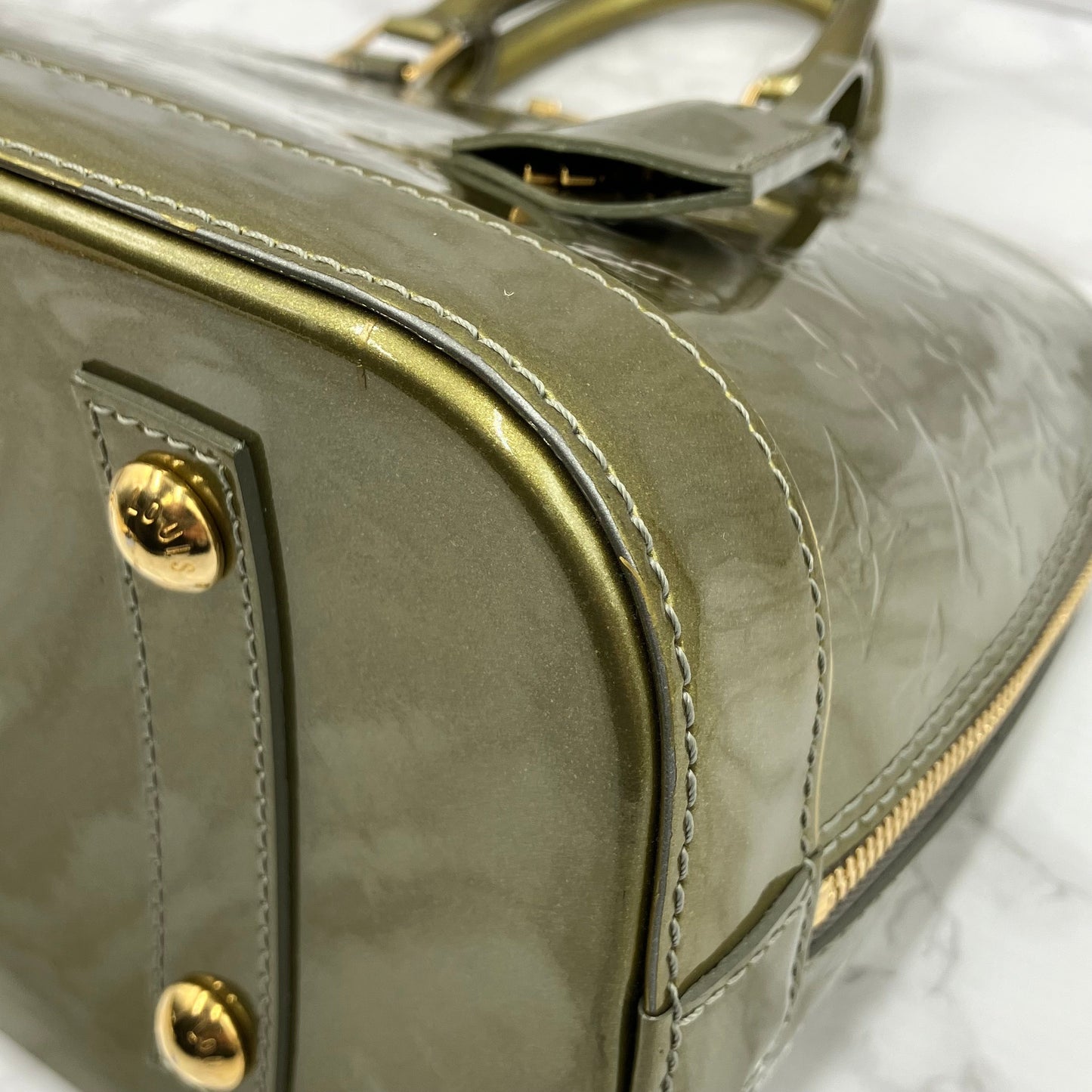 LOUIS VUITTON Vernis Alma handbag