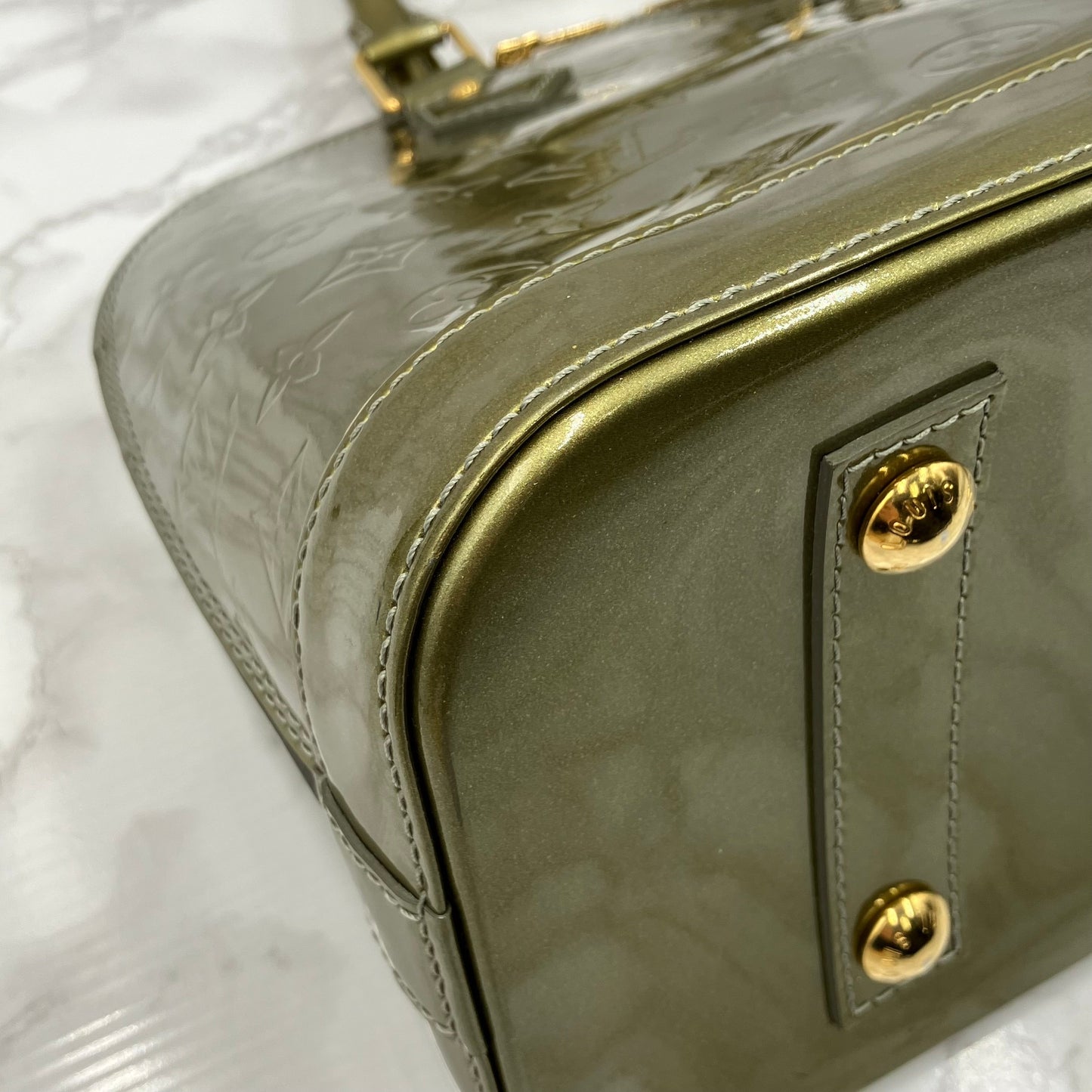 LOUIS VUITTON Vernis Alma handbag