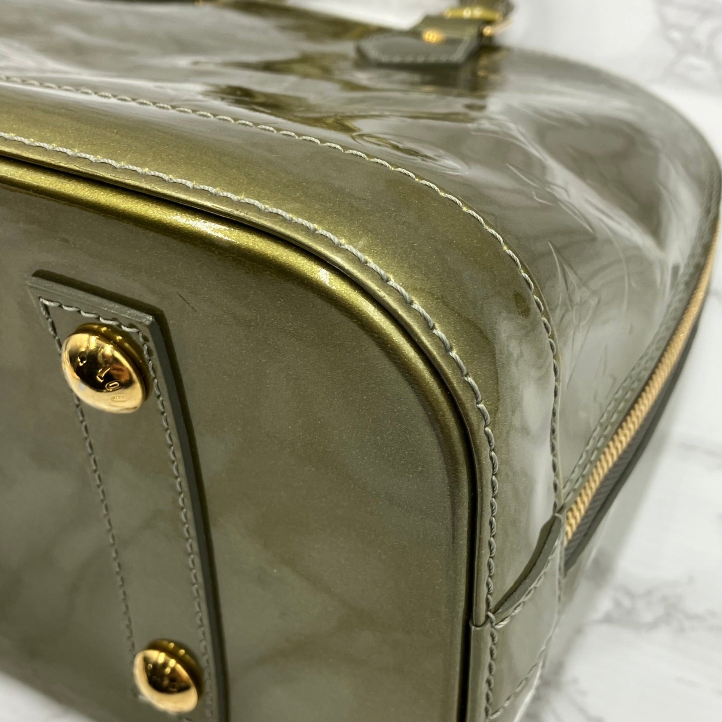 LOUIS VUITTON Vernis Alma handbag
