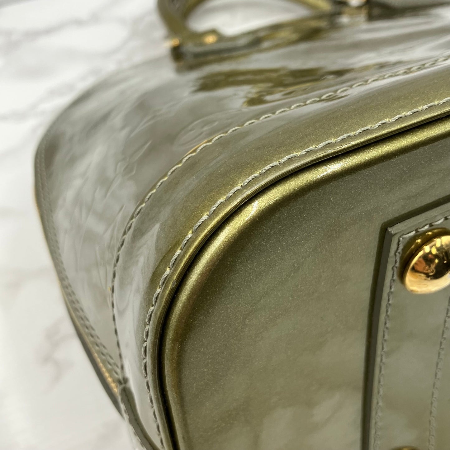 LOUIS VUITTON Vernis Alma handbag