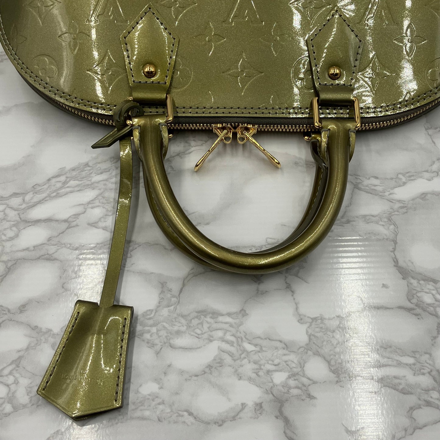 LOUIS VUITTON Vernis Alma handbag